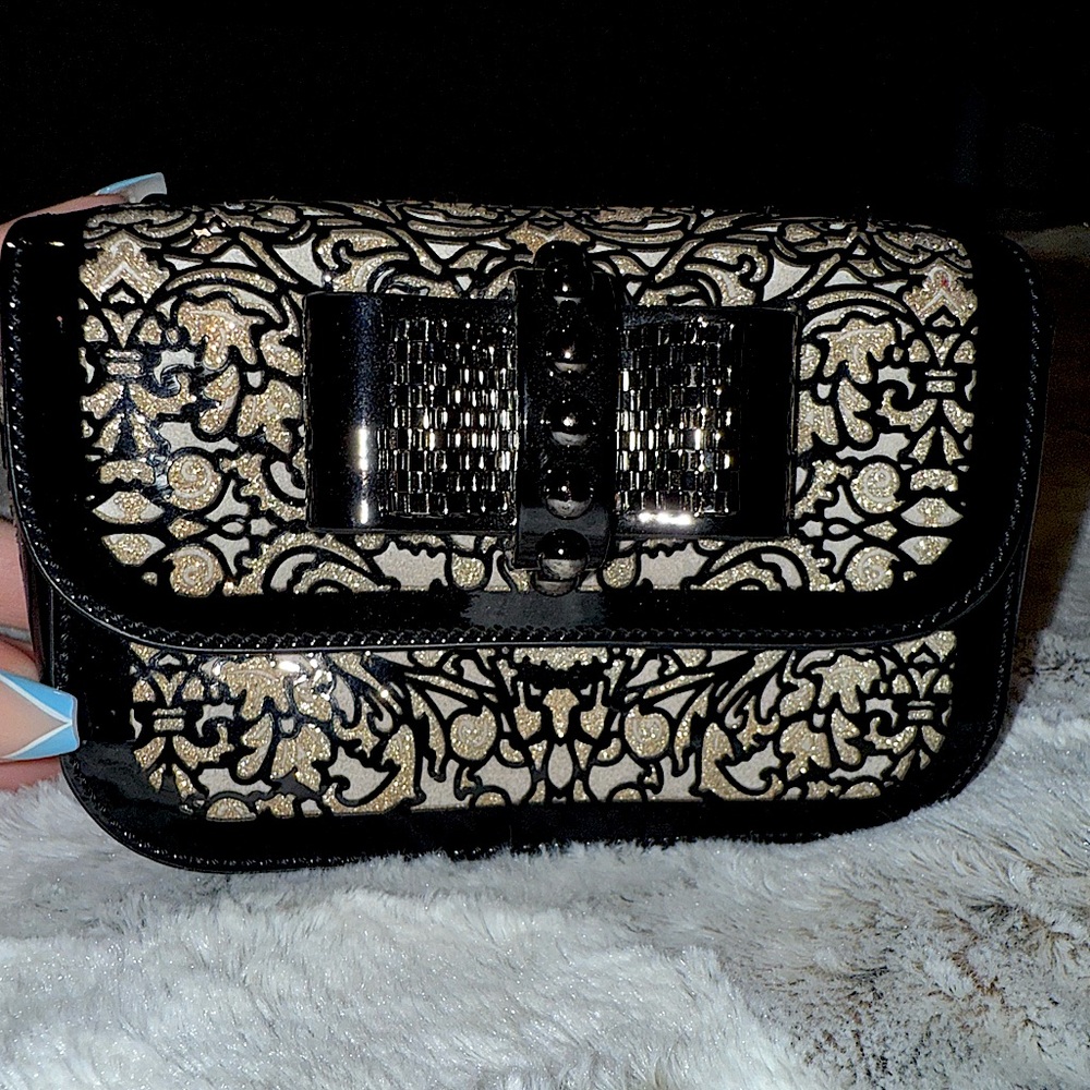 Louboutin mini preloved
